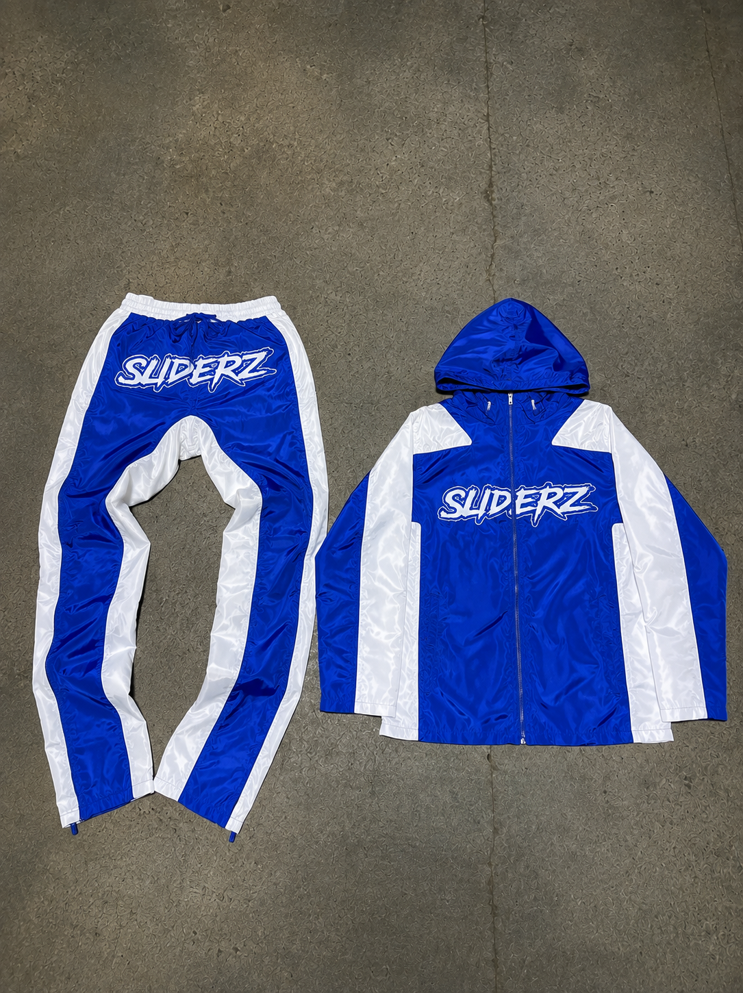 SLIDERZ WINDBREAKER